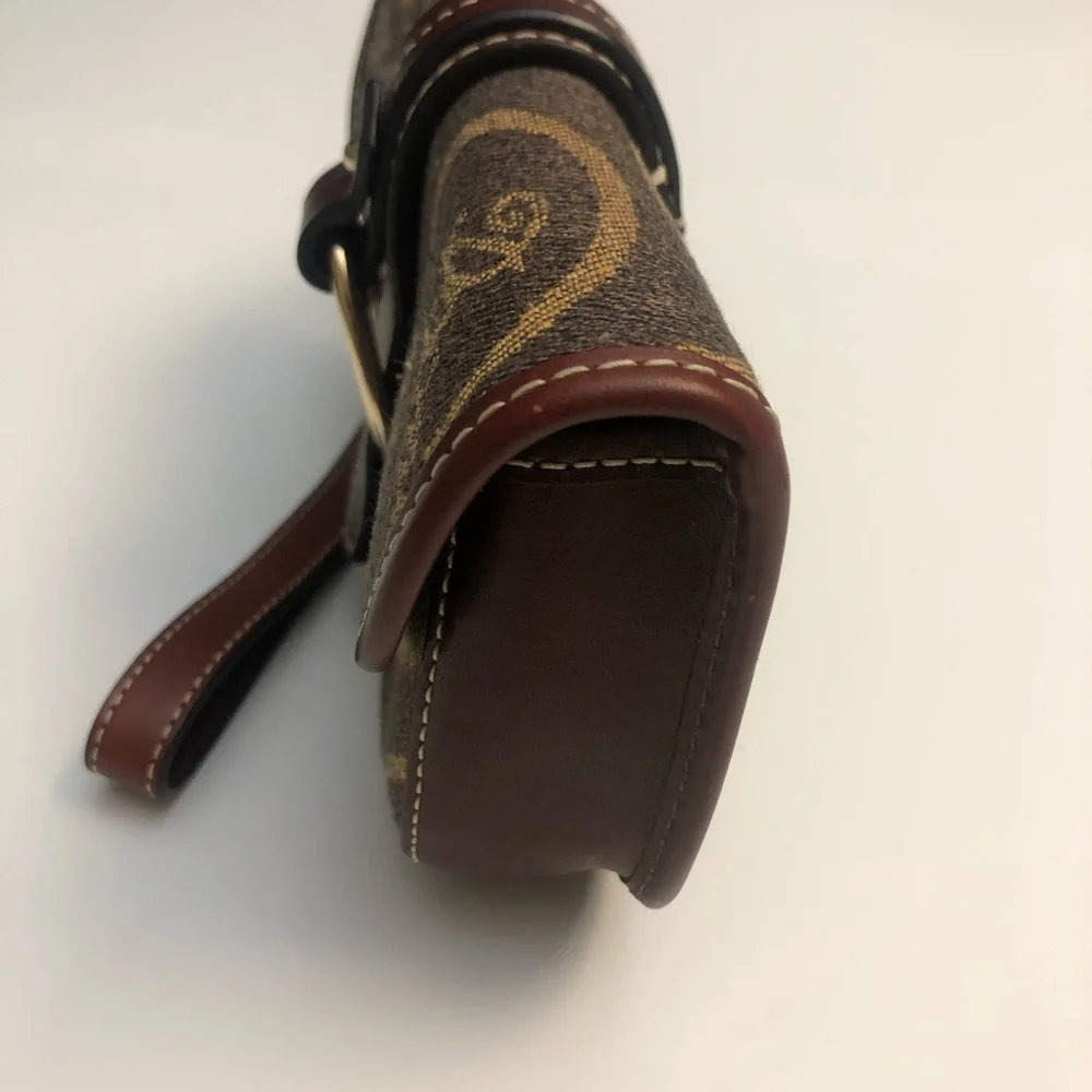 Dooney & Bourke vintage flap wristlet